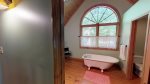 Shared loft bath with clawfoot tub